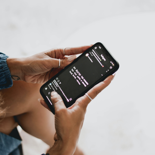 Person browsing social media on smartphone